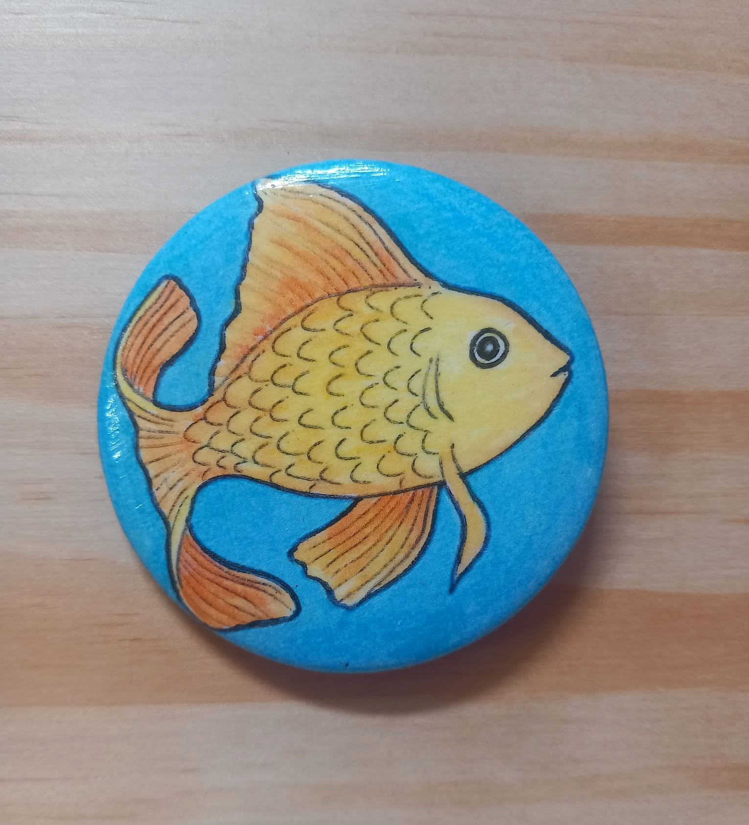 Badge poisson rouge