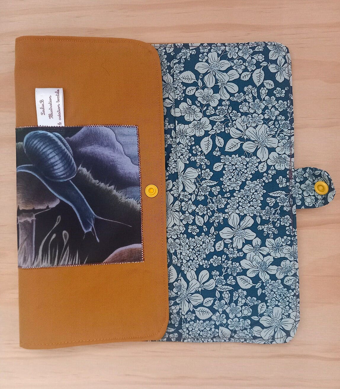 Protège carnet escargot