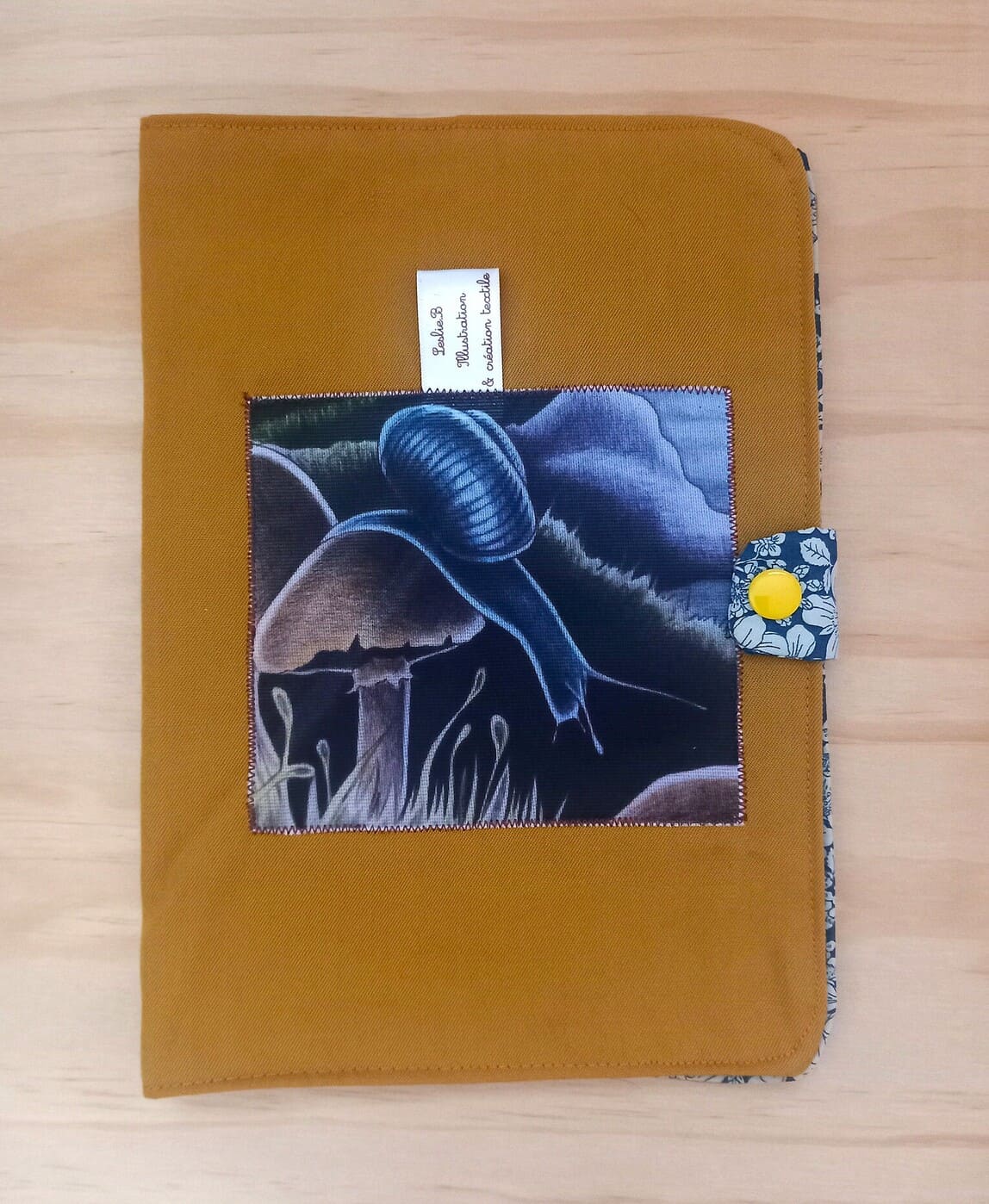Protège carnet escargot